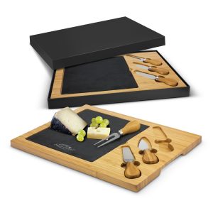The Trends Collection Slate Cheese Board is a luxury  bamboo cheese board with slate insert.  2 cheese knives and fork.  Laser Engraved.  Great corporate gifts.
