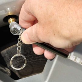 The TRENDS Tyre Pressure Gauge Key Ring is a mini tyre gauge on a key chain.  Measures up to 50psi.  Laser engraving available. Great automotive promo product.