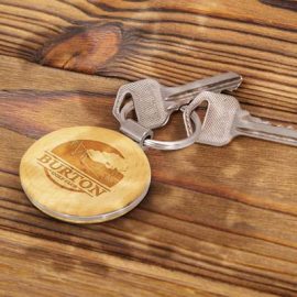 The TRENDS Echo Key Ring is a round natural beech wood key ring with metal trim.  Laser engraves to natural etch.  Available in round, rectangle or square.