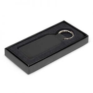 The TRENDS Prince Leather Key Ring is a rectangular leather key ring.  Matching stitching.  Print or debossing of your logo.