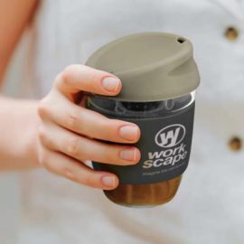 The TRENDS Nova Cup - Borosilicate 250ml is an elegant reusable borosilicate coffee cup.  15 colours for lids and bands.  Great branded cups.