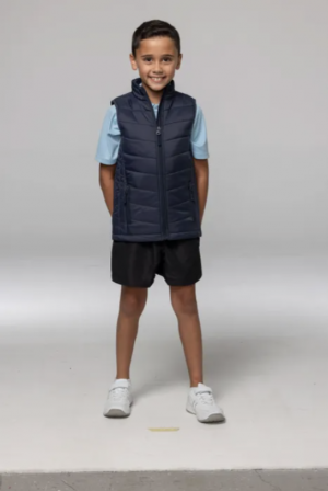The Aussie Pacific Snowy Kids Vest is a nylon/polyester puffer vest. Sizes 4 - 16. Black or Navy. Great winter puffer vests.