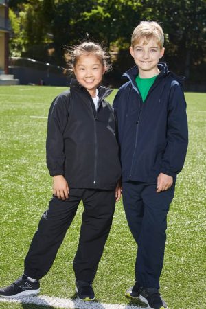 KTP02-Latitude-Kids-Track-Pants- The Unlimited Edition Latitude Kids Track Pants are showerproof track pants with pockets with side zips. Available in 2 colours. Sizes 4 - 12.