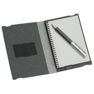 9141-a6-jotter-open The Catalogue A6 Jotter has a bonded leather cover with spiral bound writing pad. Elastic closure. Pen loop.