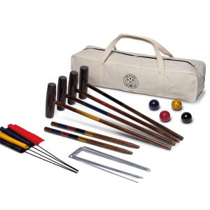 backyard-croquet-set-lifestyle The Catalogue Backyard Croquet Set is an antique natural wood grain croquet set. Includes mallets, balls, stakes, hoops and flags.