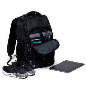 The Catalogue Grid-Lock Backpack is a polyester backpack with multiple compartments. Shoe compartment. Padded iPad/tablet pocket.
