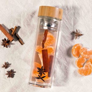 tea-&-fruit-infuser-bottle_lifestyle The Catalogue Tea & Fruit Infuser Bottle is a glass bottle with a stainless steel infuser and strainer. Bamboo lid. BPA free.